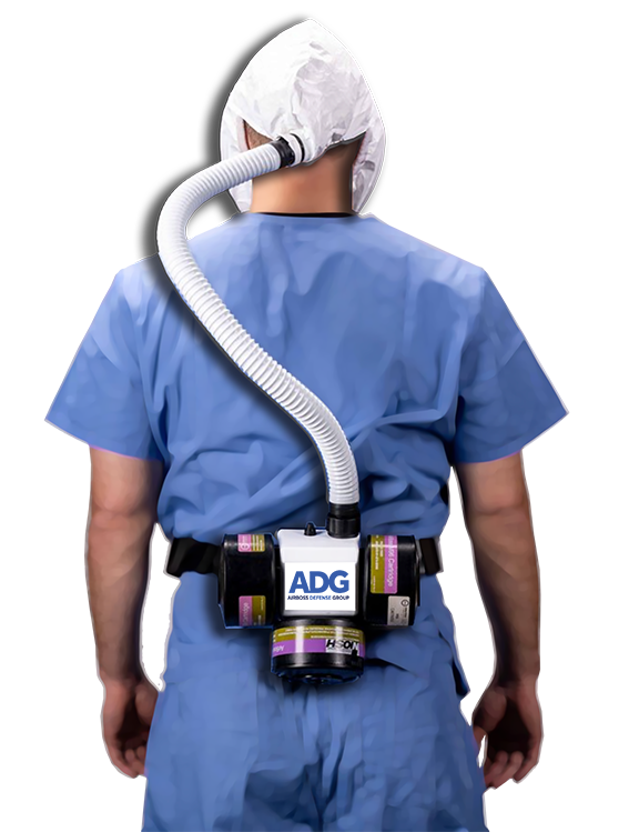 Back of male nurse wearing FlexAir PAPR system with hood