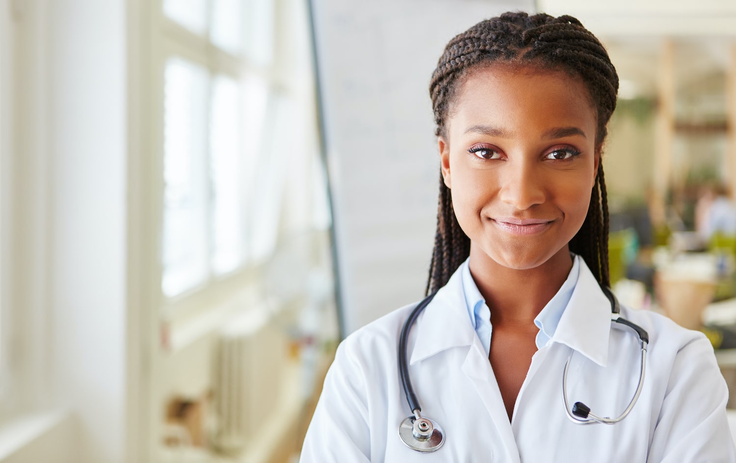 Female African American nurse looking at camera